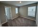 Bright bedroom with neutral carpet and two windows that allows plenty of light at 1268 Newton St, Avon, IN 46123