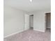 Neutral bedroom with light carpet, white trim, and two closets at 1268 Newton St, Avon, IN 46123