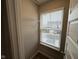 Walk-in closet with a window for natural light and a wire rack for organizing clothes at 1268 Newton St, Avon, IN 46123