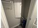 A closet features white doors, shelving, and an electrical panel on the back wall at 1268 Newton St, Avon, IN 46123