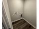 The laundry room features washer/dryer hookups and durable flooring for easy cleaning and maintenance at 1268 Newton St, Avon, IN 46123