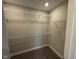 Walk-in closet with neutral carpet and installed wire shelving at 1268 Newton St, Avon, IN 46123