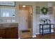 Bright entryway showing decorative wall decor, and view of the front door at 12866 Thames Dr, Fishers, IN 46037