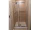 Tiled standing shower with glass doors at 12866 Thames Dr, Fishers, IN 46037