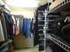 Walk-in closet with rods and shelving for optimal storage at 12866 Thames Dr, Fishers, IN 46037