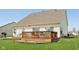 Expansive backyard area featuring a wooden deck and lush lawn, creating a perfect setting for outdoor enjoyment at 13351 Grosbeak Ct, Carmel, IN 46033