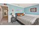 Comfortable bedroom featuring a full sized bed and carpeted floor with connected hallway at 13351 Grosbeak Ct, Carmel, IN 46033