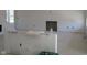 Unfinished living room with fireplace and large windows at 1426 Redwood Dr, Crawfordsville, IN 47933