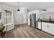 Bright kitchen featuring stainless steel appliances, white cabinetry, and modern fixtures at 1463 Rebecca Ln, Franklin, IN 46131