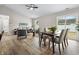 Bright open living space with dining area, modern furnishings, and hardwood flooring at 1463 Rebecca Ln, Franklin, IN 46131