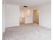 Bright hallway featuring neutral carpet and white walls at 15702 Cobbs Crk Ln, Noblesville, IN 46060