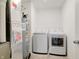 Laundry room with new washer, dryer, and water heater at 15702 Cobbs Crk Ln, Noblesville, IN 46060