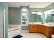 This bathroom has a large corner bathtub and a double sink vanity at 16 Corkwood Ct, Brownsburg, IN 46112