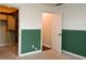 This bedroom has an open walk-in closet and a doorway at 16 Corkwood Ct, Brownsburg, IN 46112