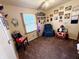Cozy bedroom with personal decorations, a comfortable chair, and a bright window view at 2126 Dawnshire Dr, Columbus, IN 47203