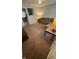 Spacious living room with neutral walls and carpet, featuring a sectional couch and accent tables with lamps at 2126 Dawnshire Dr, Columbus, IN 47203
