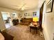 Cozy living room featuring neutral walls, plush carpeting, and comfortable seating arrangement at 2126 Dawnshire Dr, Columbus, IN 47203