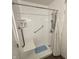 Accessible shower with grab bars and a built-in seat for safety and convenience at 2126 Dawnshire Dr, Columbus, IN 47203