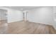 Spacious bedroom with wood-look floors, neutral paint, and ample natural light at 2200 W Christy Ln, Muncie, IN 47304