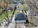 Aerial view of the home's fenced backyard and detached garage that adds privacy and parking space at 2209 Carrollton Ave, Indianapolis, IN 46205