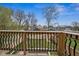 View of the fenced backyard and surrounding neighborhood from the balcony at 2209 Carrollton Ave, Indianapolis, IN 46205
