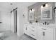 Bathroom with double vanity and mirrors at 2209 Carrollton Ave, Indianapolis, IN 46205