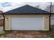 Exterior view of detached two-car garage at 2209 Carrollton Ave, Indianapolis, IN 46205