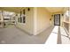 Covered front porch featuring decorative railings, spacious layout, and natural light at 2209 Carrollton Ave, Indianapolis, IN 46205