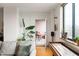 Living room with a doorway leading to a balcony and cityscape views at 225 N New Jersey St # Apt 48, Indianapolis, IN 46204