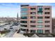 Contemporary building exterior featuring upscale architecture, gated entry and ample parking at 225 N New Jersey St # Apt 48, Indianapolis, IN 46204