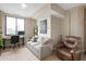 Relaxing living room with sofa, recliner, workspace, and a view at 225 N New Jersey St # Apt 48, Indianapolis, IN 46204