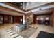 Elegant lobby area featuring modern furnishings, tiled floors and decorative lighting at 225 N New Jersey St # Apt 48, Indianapolis, IN 46204