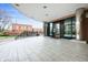 Lobby entrance with tiled floor and curved, glass entry at 225 N New Jersey St # Apt 48, Indianapolis, IN 46204
