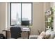 Bright office space features large windows with a nice building view and sleek desk setup at 225 N New Jersey St # Apt 48, Indianapolis, IN 46204