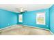 Vibrant bedroom with calming blue walls and two windows, offering a refreshing view of the outdoors at 229 Waterford Ct, Avon, IN 46123