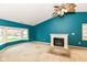 Inviting living room featuring a fireplace, large window, and vaulted ceiling at 229 Waterford Ct, Avon, IN 46123