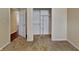 Bedroom with closet including shelf and rod, carpet floors and neutral colored walls at 2606 Bristlecone Dr, Indianapolis, IN 46217