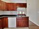 Well-equipped kitchen with stainless steel sink and white appliances at 2606 Bristlecone Dr, Indianapolis, IN 46217