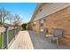 Large wooden deck with railing and outdoor seating perfect for relaxing at 2753 N High School Rd, Indianapolis, IN 46224