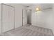 Bedroom with carpet, painted walls, light fixture and closet at 2753 N High School Rd, Indianapolis, IN 46224