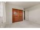 A bedroom featuring carpet, painted walls, one window and a wood closet door at 2753 N High School Rd, Indianapolis, IN 46224