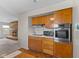 A kitchen features wooden cabinets and stainless steel oven at 2753 N High School Rd, Indianapolis, IN 46224