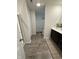 Well-lit bathroom featuring a modern vanity with dual sinks, sleek fixtures, and stylish flooring at 280 Walker Dr, Whiteland, IN 46184