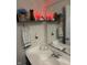 Bathroom vanity and shelf with decorative bunnies and floral arrangements at 280 Walker Dr, Whiteland, IN 46184