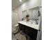 Modern bathroom with dual sinks, a sleek vanity, stylish mirror, and a shower-tub combination at 280 Walker Dr, Whiteland, IN 46184