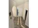Stylish foyer with wood-look flooring and an arched entryway at 280 Walker Dr, Whiteland, IN 46184