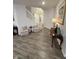 Inviting foyer featuring stylish decor, modern flooring, and a staircase leading to the upper level at 280 Walker Dr, Whiteland, IN 46184