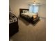 Main bedroom with bed, neutral decor, ceiling fan, and window with curtains at 280 Walker Dr, Whiteland, IN 46184