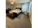 Main bedroom with bed, neutral decor, ceiling fan, and window with curtains at 280 Walker Dr, Whiteland, IN 46184