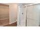 Bright bathroom featuring a walk-in closet, toilet, and modern glass enclosed shower with chrome hardware at 321 Bluestem Ln, Whiteland, IN 46184